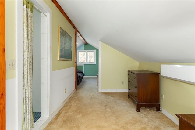 additional living space with light colored carpet and lofted ceiling