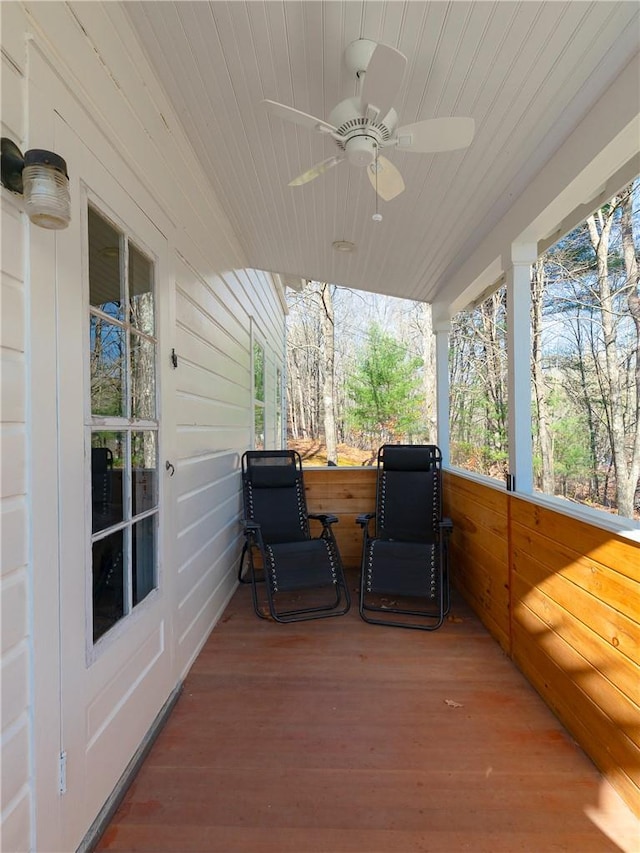 wooden deck with ceiling fan