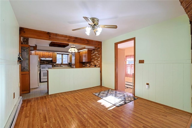 kitchen with ceiling fan, baseboard heating, kitchen peninsula, light hardwood / wood-style floors, and white appliances