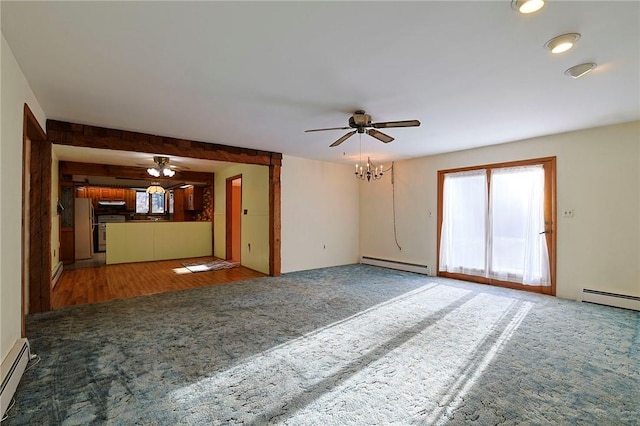 unfurnished living room featuring dark wood-type flooring, a baseboard radiator, and ceiling fan with notable chandelier