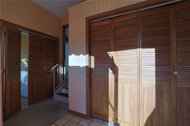 interior space featuring light tile patterned floors