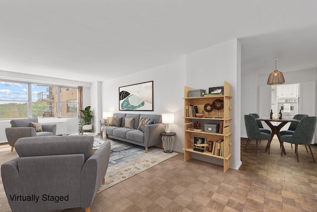 living room with parquet flooring