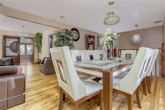 dining room with light wood-type flooring