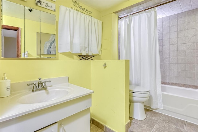 full bathroom featuring tile patterned flooring, shower / bath combination with curtain, vanity, and toilet