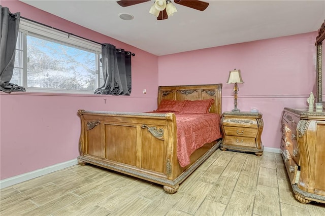 bedroom featuring ceiling fan and light hardwood / wood-style flooring