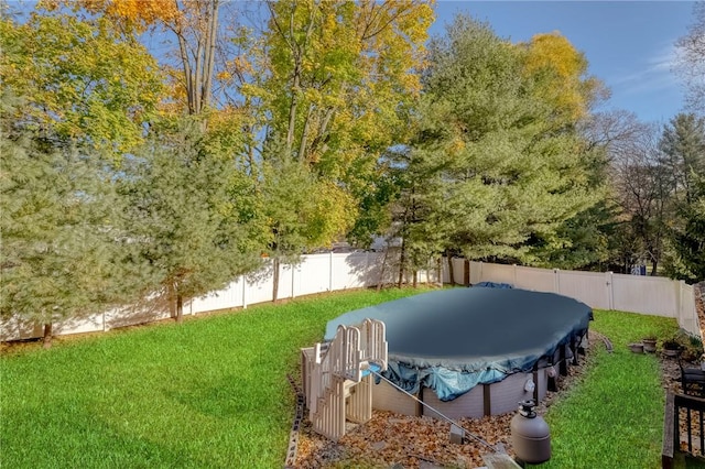 view of yard with a trampoline