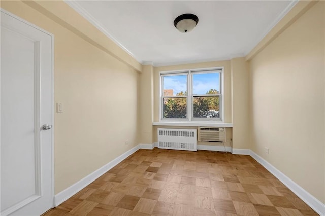 3755 Henry Hudson Pkwy Unit 7E, Bronx, NY 10463 - spare room featuring radiator, baseboards, a wall unit AC, and ornamental molding