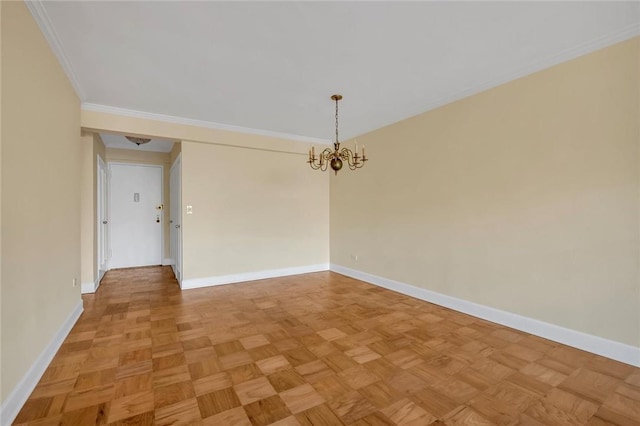 3755 Henry Hudson Pkwy Unit 7E, Bronx, NY 10463 - spare room featuring baseboards, a chandelier, and crown molding