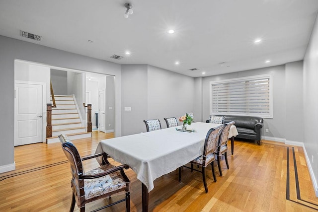 dining area with light wood-type flooring