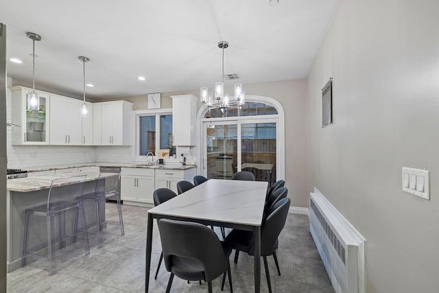 dining space with sink