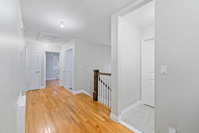 hallway featuring light hardwood / wood-style floors