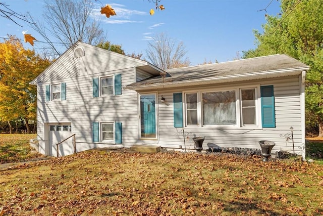 split level home featuring a garage