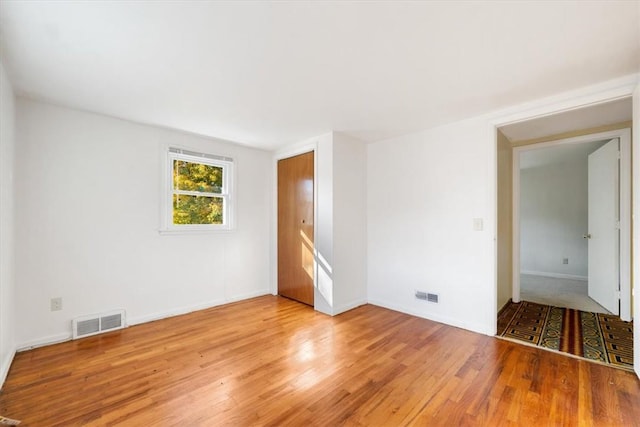 empty room featuring light hardwood / wood-style floors