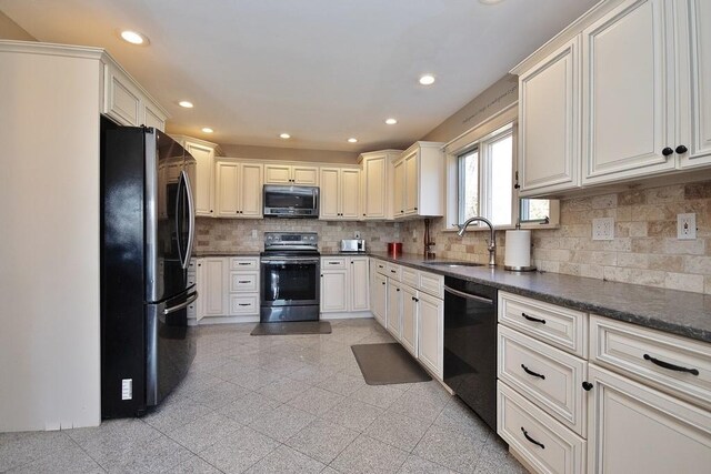 kitchen featuring backsplash, sink, and stainless steel appliances