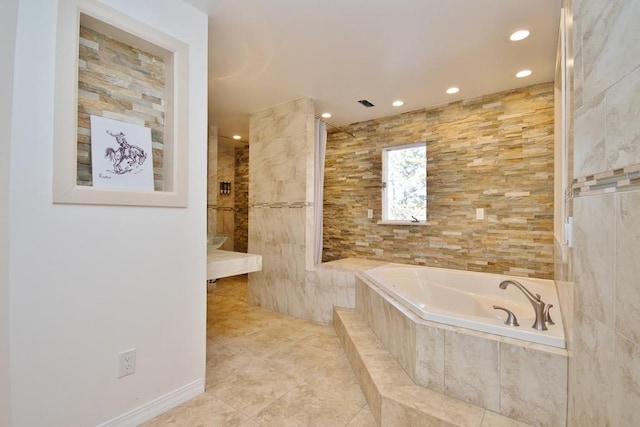 bathroom featuring tile patterned flooring and independent shower and bath