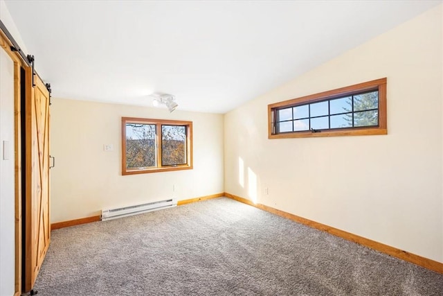 unfurnished room with carpet flooring, a barn door, baseboard heating, and lofted ceiling