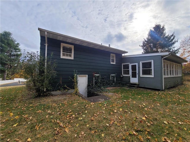 67 Harth Dr, New Windsor, NY 12553 - rear view of property featuring entry steps and a yard
