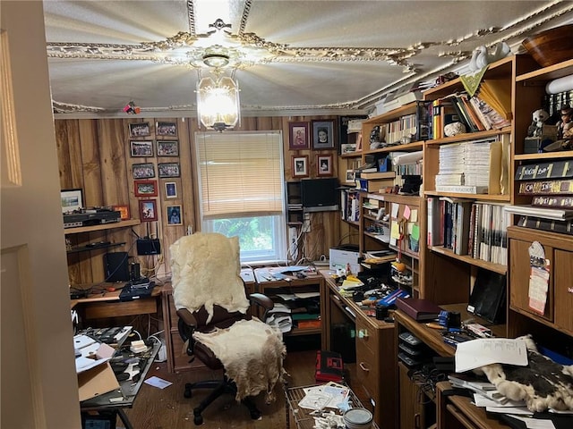 miscellaneous room with hardwood / wood-style floors, ornamental molding, and wooden walls