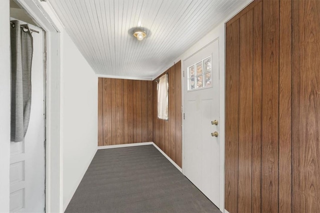 hallway with wooden walls