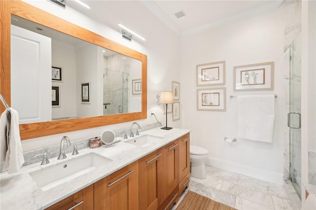 11 River St Unit 401, Sleepy Hollow, NY 10591 - full bath with marble finish floors, a marble finish shower, crown molding, double vanity, and toilet