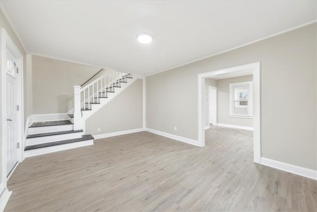 unfurnished living room with light hardwood / wood-style flooring