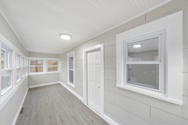 view of unfurnished sunroom