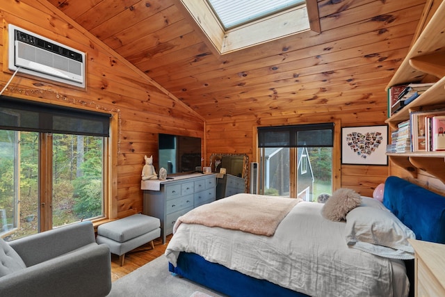 bedroom with lofted ceiling with skylight, wooden ceiling, wooden walls, light wood-type flooring, and a wall unit AC