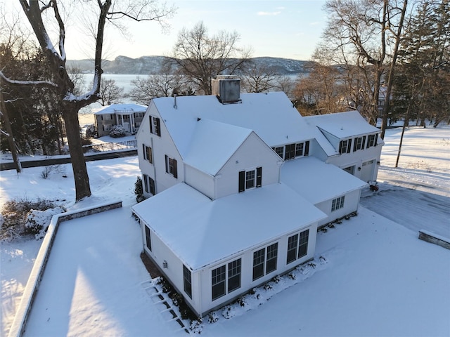 205 River Rd, Briarcliff Manor, NY 10510 - snowy aerial view featuring a mountain view