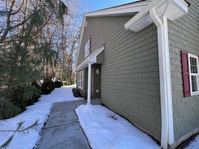 view of snow covered property