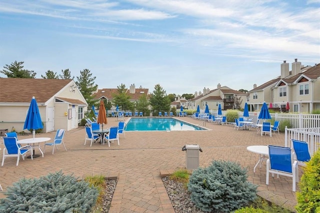 view of swimming pool with a patio area