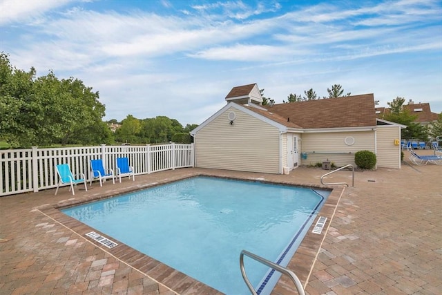 view of pool featuring a patio area