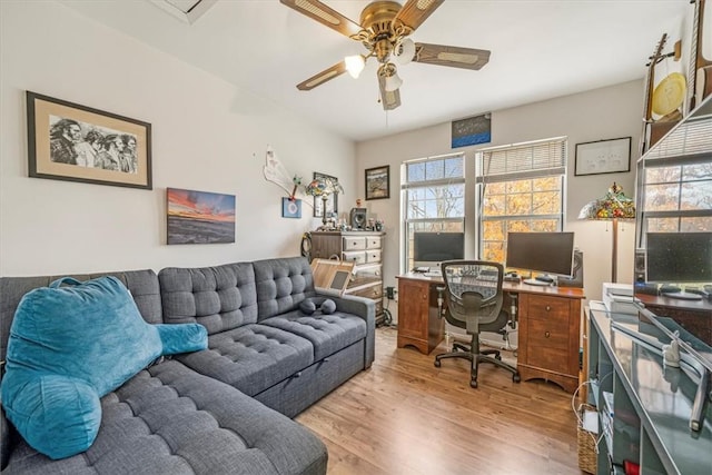 office area with plenty of natural light, ceiling fan, and light hardwood / wood-style flooring