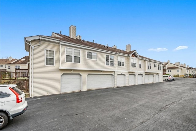 exterior space featuring a garage