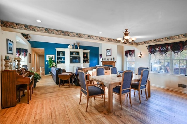 339 Jessup Rd, Florida, NY 10921 - dining area with a chandelier, light wood finished floors, and recessed lighting