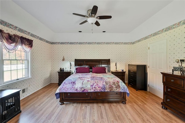 339 Jessup Rd, Florida, NY 10921 - bedroom with wallpapered walls, light wood-type flooring, and ceiling fan