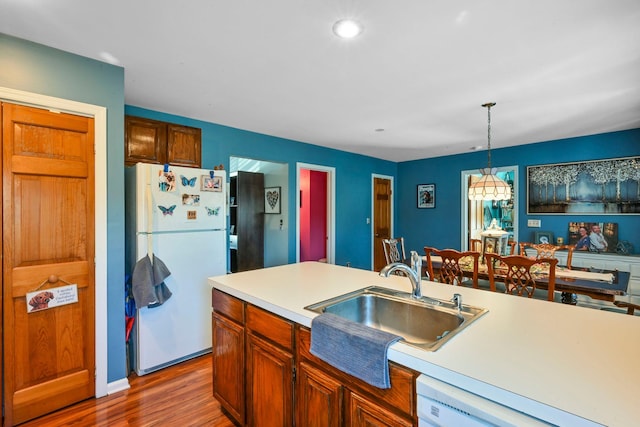 339 Jessup Rd, Florida, NY 10921 - kitchen featuring white appliances, light countertops, wood finished floors, hanging light fixtures, and recessed lighting