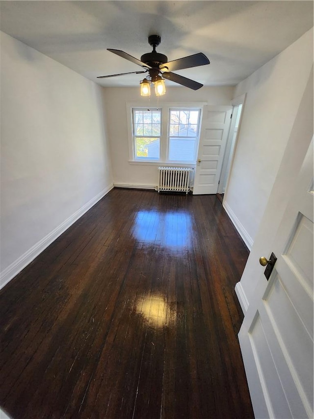 spare room with wood walls