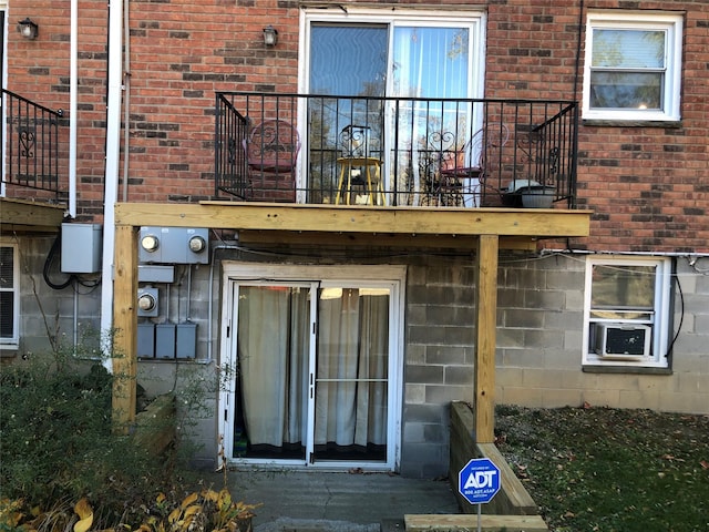 1668 Rte 9 Unit 10B, Wappingers Falls, NY 12590 - rear view of house featuring brick siding and a balcony