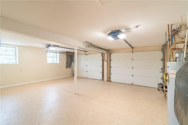 garage with a garage door opener, electric panel, and water heater