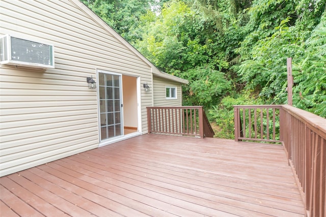 wooden terrace featuring a wall mounted air conditioner