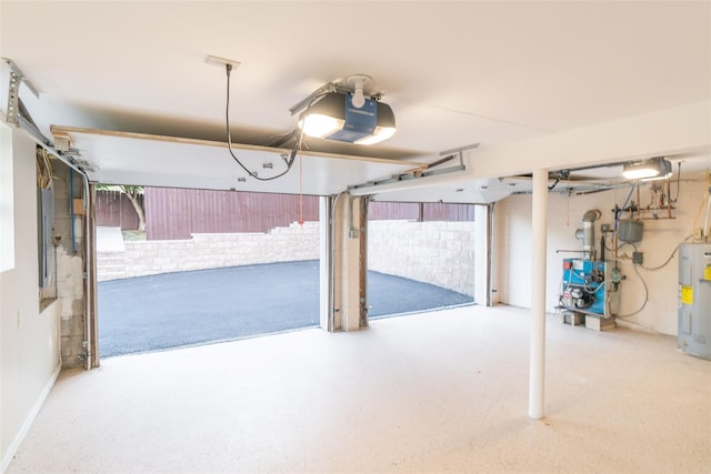 garage with water heater, a heating unit, electric panel, and a garage door opener