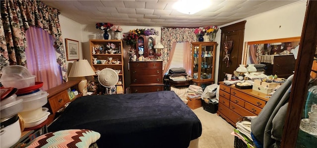 carpeted bedroom with ornamental molding