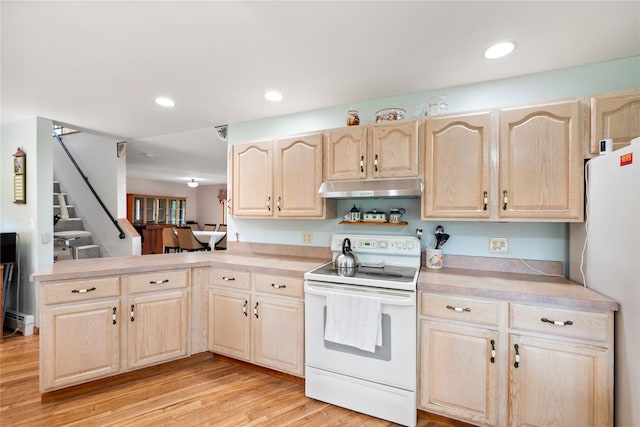 kitchen featuring light brown cabinets, white appliances, a baseboard heating unit, light hardwood / wood-style floors, and kitchen peninsula