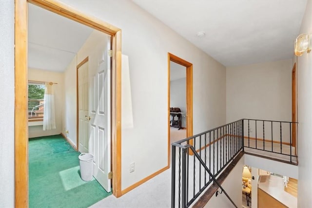 hallway featuring carpet flooring