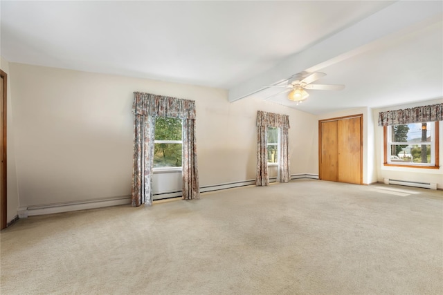 empty room with vaulted ceiling with beams, a baseboard radiator, ceiling fan, and light colored carpet