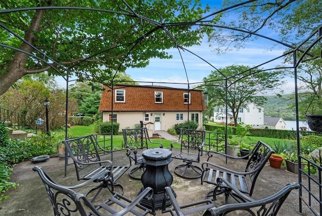 view of patio featuring a fire pit