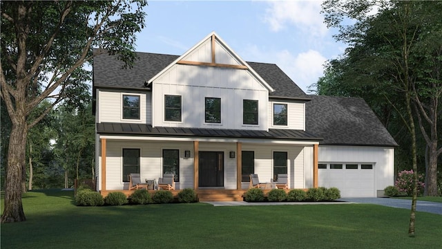 modern inspired farmhouse with a porch, a garage, and a front lawn