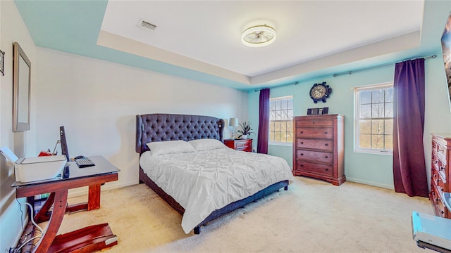 bedroom featuring light colored carpet