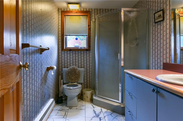 bathroom featuring vanity, toilet, a shower with door, and a baseboard radiator