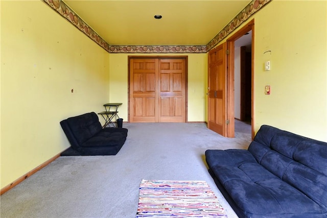 living area with carpet flooring